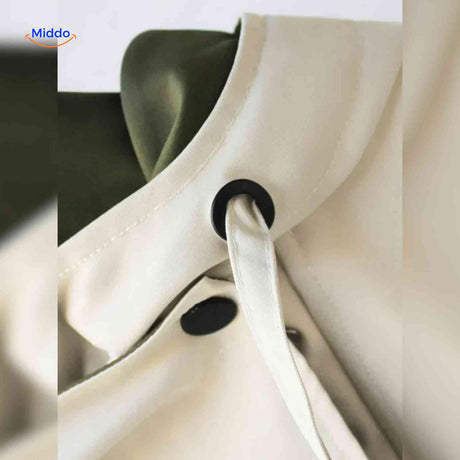 AquaShell jas detailfoto creme met groen en knopen www.middo.nl