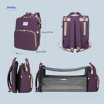 BabyLuxe Rugtas paars luiertas met wiegfunctie en maten www.middo.nl