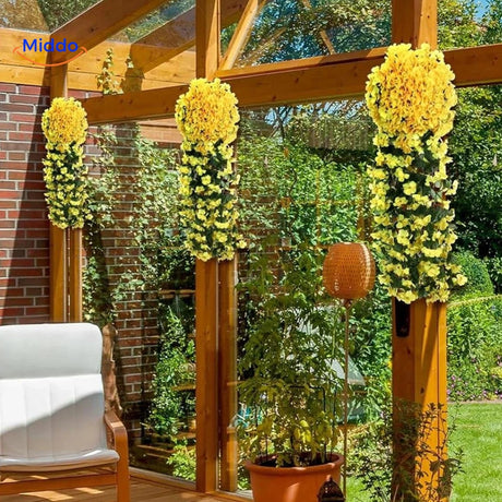 Gele charmante orchideeën voor tuinomheining