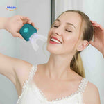 Dentora Tandenborstel vrouw gebruikt groen model met licht www.middo.nl