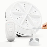 EasyWash mini-wasmachine met waspoedercompartiment en doseerlepel.