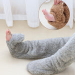 Close-up van FluffSoks met antislip zool in grijs