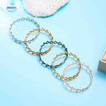 Morphix Ring goud armband met rode strass www.middo.nl