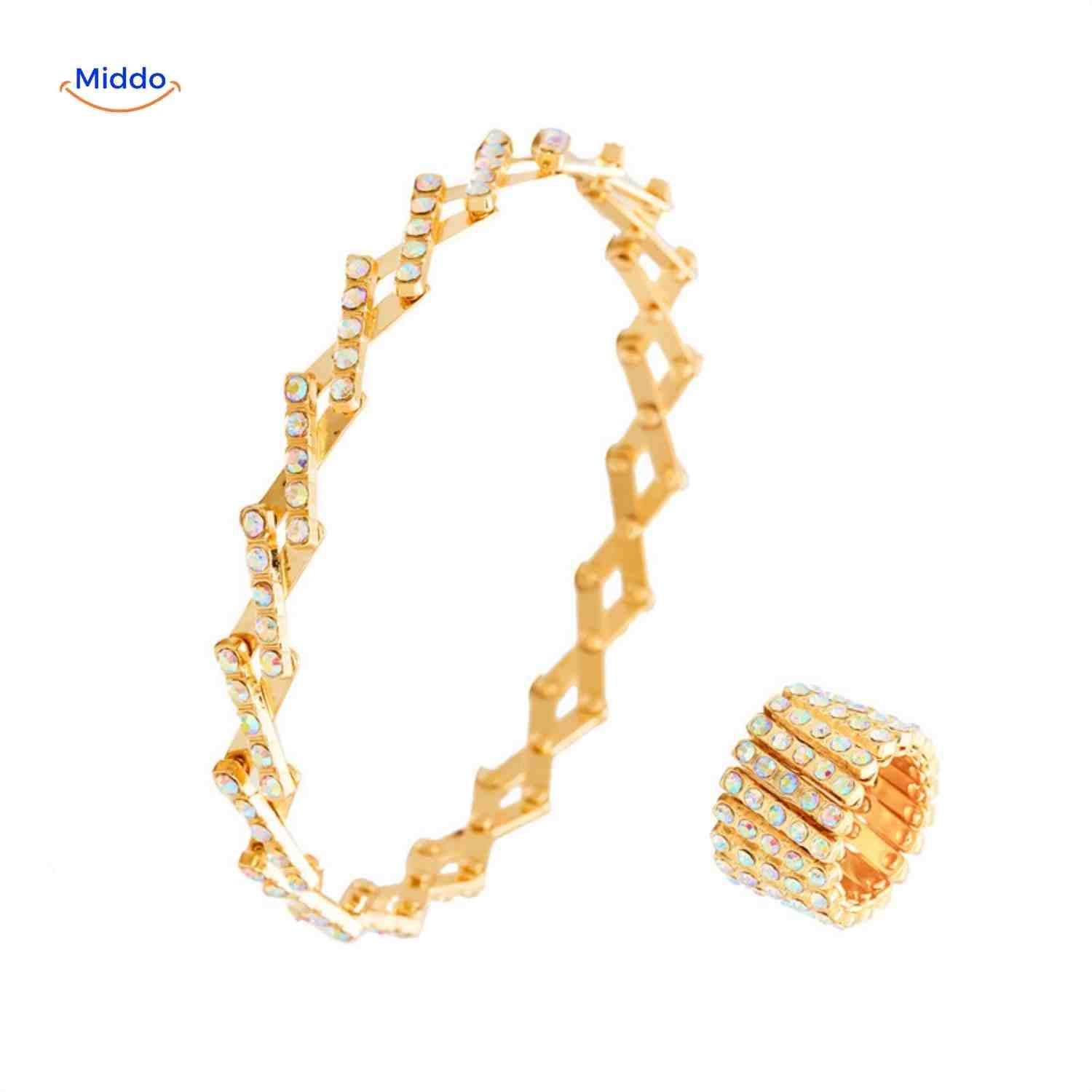 Morphix Ring goud met witte strass armband en ring www.middo.nl