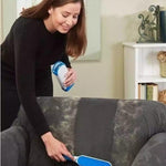 Pluizenborstel met zelfreinigende basis en opbergmogelijkheid.