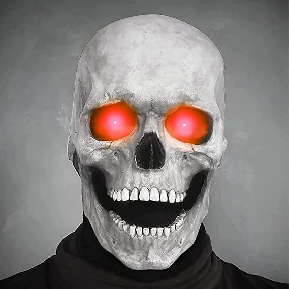 Witte schedelmasker met felrode ogen en grijns