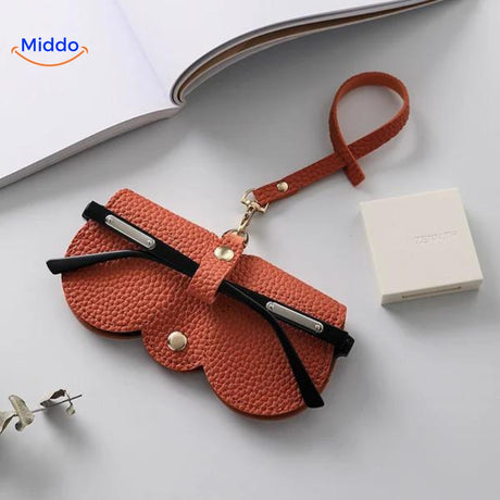 Productfoto van de oranje brillenhoes CompactVision