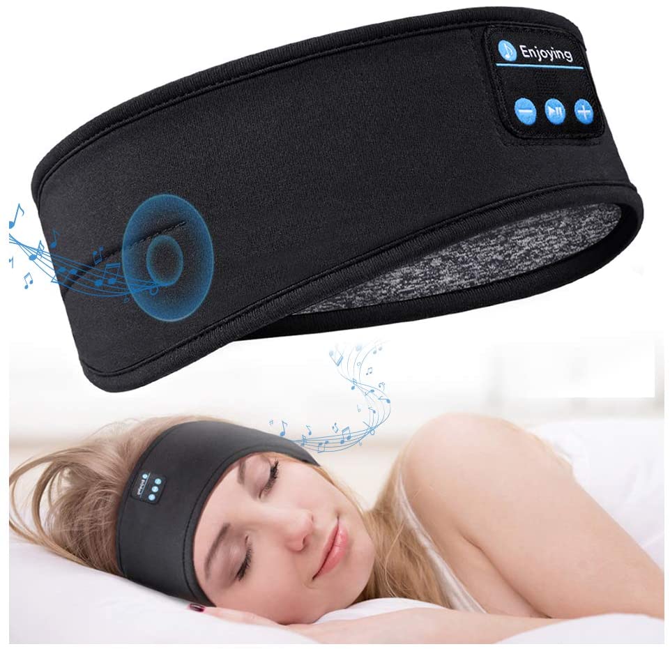 Vrouw slaapt comfortabel met een zwarte Sleepband met Bluetooth