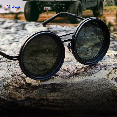 SunGuard ND9 sunglasses on rock with hummer