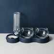 Lege TripleFeeder voedertray met twee kommen en waterfles.