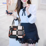 VivaLuxe Tote met stijlvolle outfit en gekleed persoon www.middo.nl