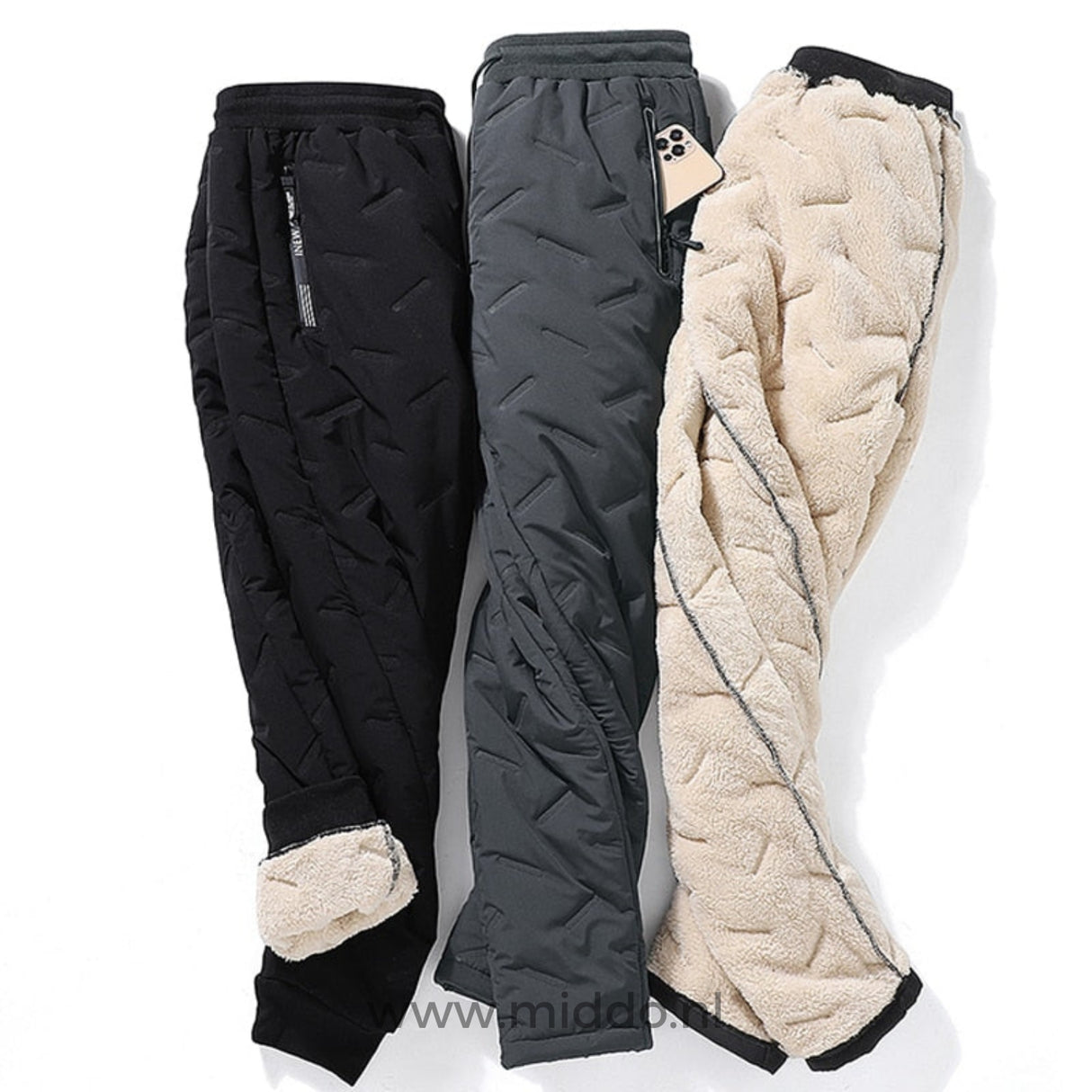 Drie WarmGuard Thermo Unisex Broeken in verschillende kleuren en een uitgestoken voering