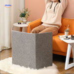 Warmilo Voetverwarmer verwarmde voeten op bank www.middo.nl