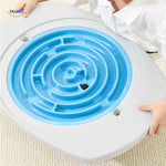 balancio bordspel kind speelt met blauwe spiraal doolhof schijf www.middo.nl