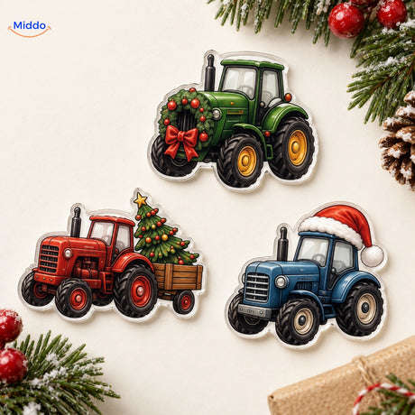 Detail van platte acrylhangers met kersttractorillustraties