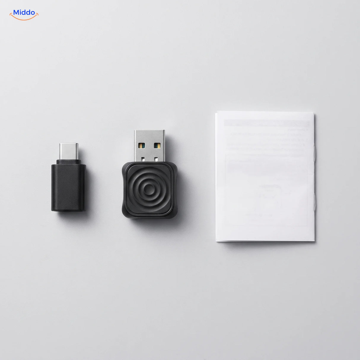 Inhoud van de doos: adapter, USB-C-adapter en handleiding