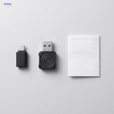 Inhoud van de doos: adapter, USB-C-adapter en handleiding