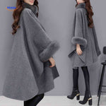 furina capejas achteraanzicht grijze bont poncho www.middo.nl