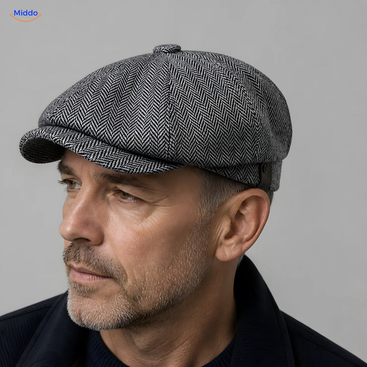 Close-up van grijze Heritage Eight flat cap met korte klep en acht panelen