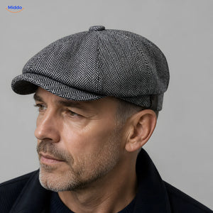 Close-up van grijze Heritage Eight flat cap met korte klep en acht panelen
