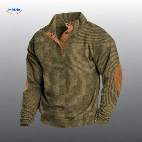 IndieWear corduroy trui in legergroen met bruine knoopsluiting en elleboogstukken.