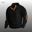 IndieWear corduroy trui in zwart met bruine knoopsluiting en elleboogstukken.