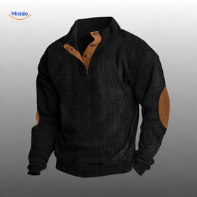IndieWear corduroy trui in zwart met bruine knoopsluiting en elleboogstukken.