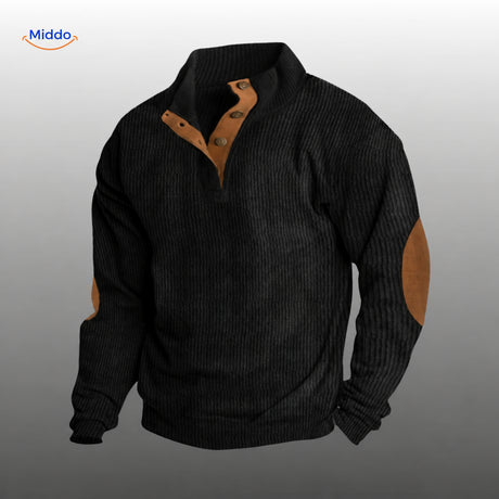 IndieWear corduroy trui in zwart met bruine knoopsluiting en elleboogstukken.