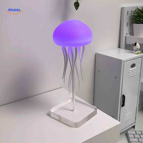 jellyglow lamp blauwe sfeerlamp met kwaldesign op bureau www.middo.nl