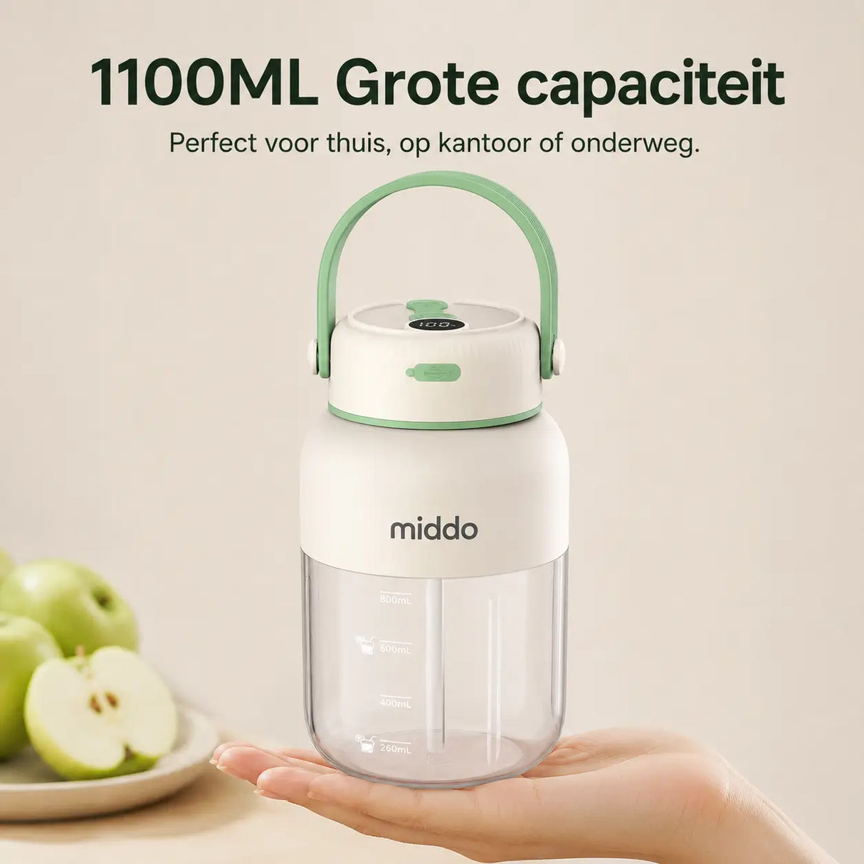 Compacte en draagbare JuiceX blender van 1100 ml in wit met groene details.