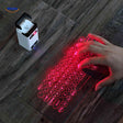 keybeam toetsenbord laserprojectie op tafel met handgebruik www.middo.nl