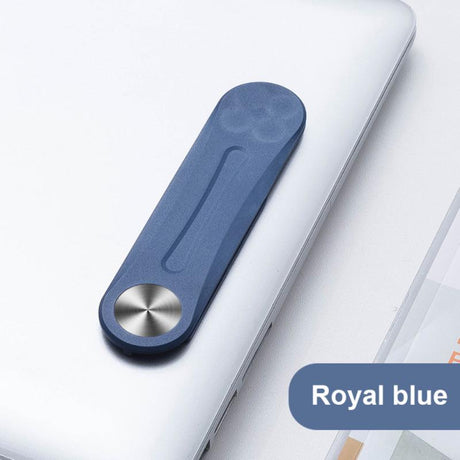 Blauwe MagnetClip op laptop dichtgevouwen.