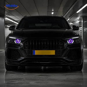 NightStare LED-ogendecoratie voor koplampen: vooraanzicht van een auto met paarse ogen in een garage.