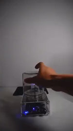 PlasmaTune Teslaspoel plasmaboog onder glazen pot demo www.middo.nl