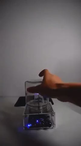 PlasmaTune Teslaspoel plasmaboog onder glazen pot demo www.middo.nl