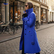 veloura mantel blauw vrouw met lange jas en zonnebril www.middo.nl