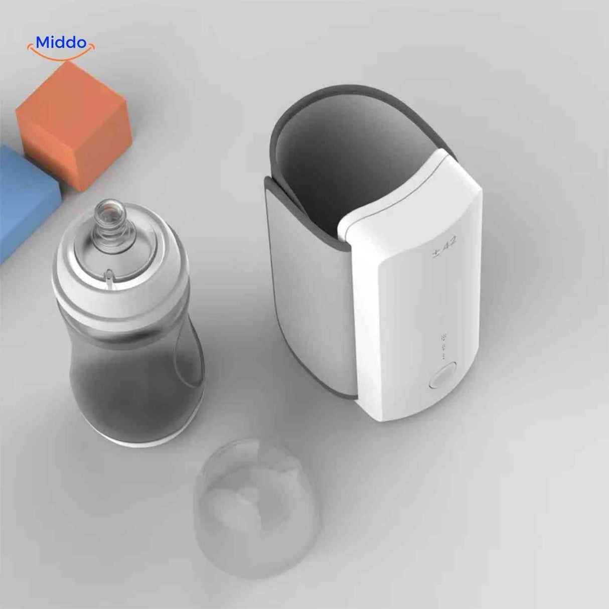 warmiboo flesverwarmer bovenaanzicht met babyfles www.middo.nl
